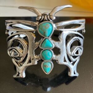 Artistic Silver Cuff Bracelet with Turquoise Stones